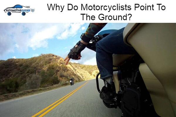 Motorcyclists Point To The Ground